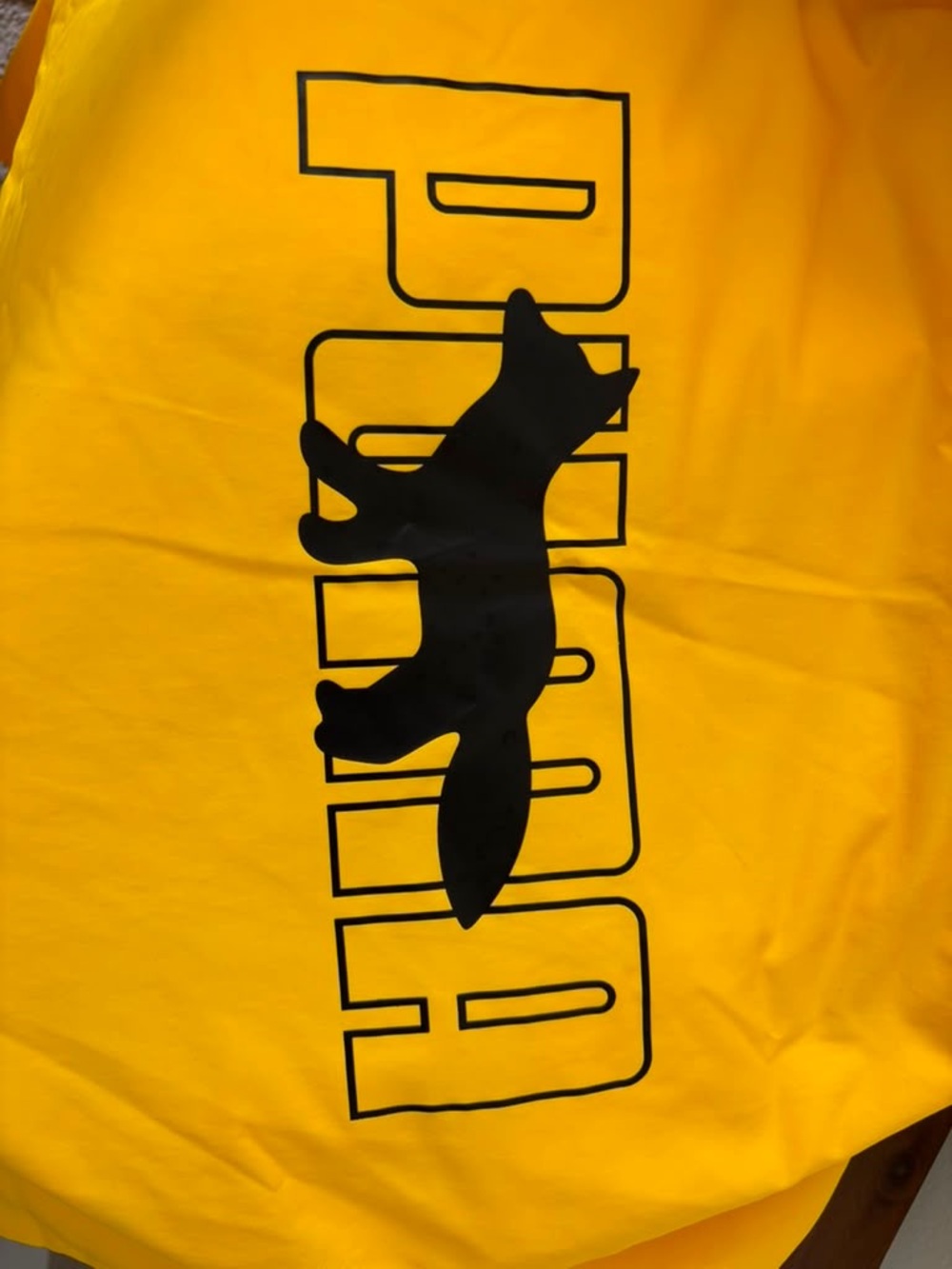Puma Madison Yellow Packable Shell Jacket with Subtle Logo Patch - Picture 9 of 10